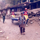 Going to the river with canoe with assistance of local onlookers